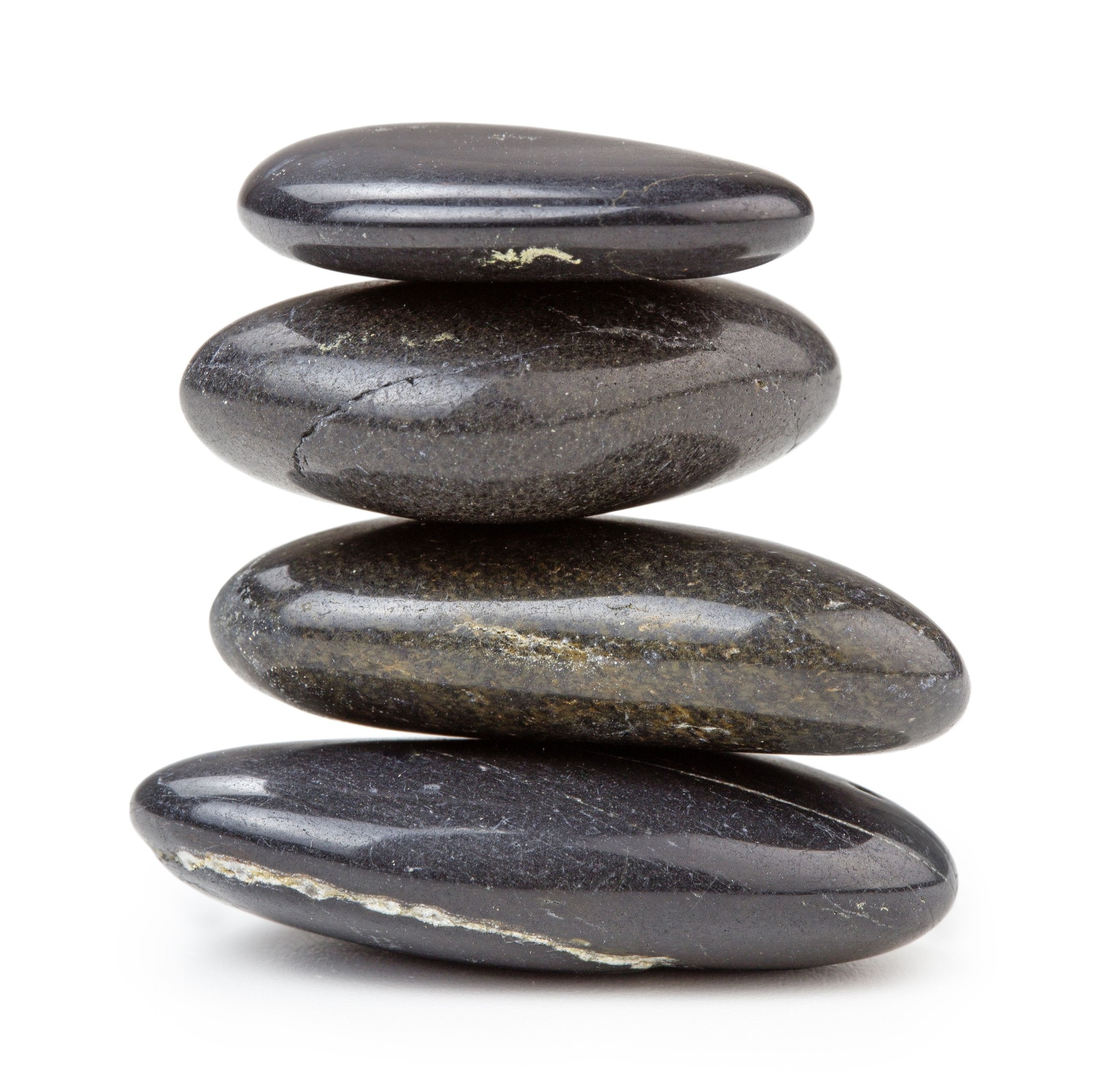 stack of black pebbles isolated on white